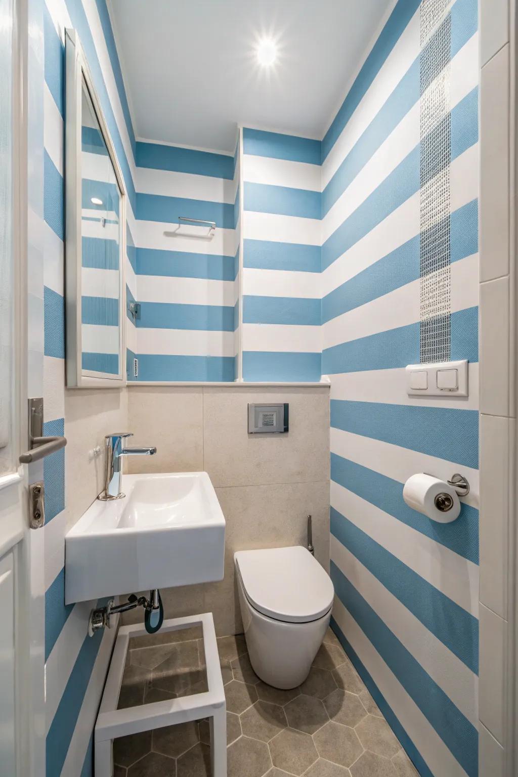 Blue and white lines introduce a nautical theme while enhancing the space's height.