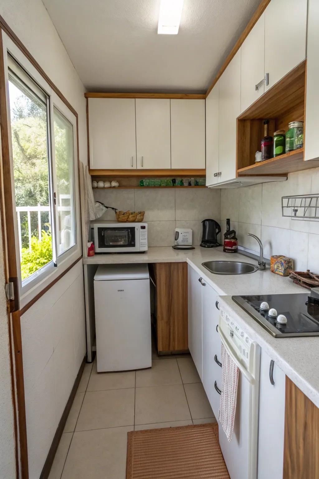 A compact kitchen layout with space-saving appliances in a small house.