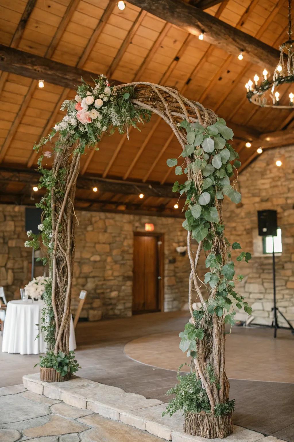 All-natural branches produce a rustic and organic wedding arch.