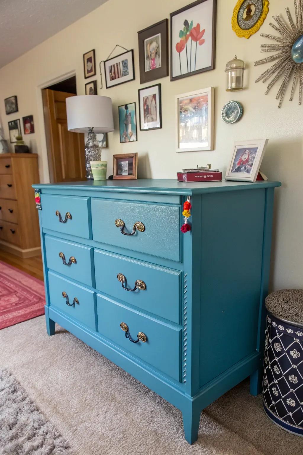 A blue dresser featuring eclectic hardware for a unique look.