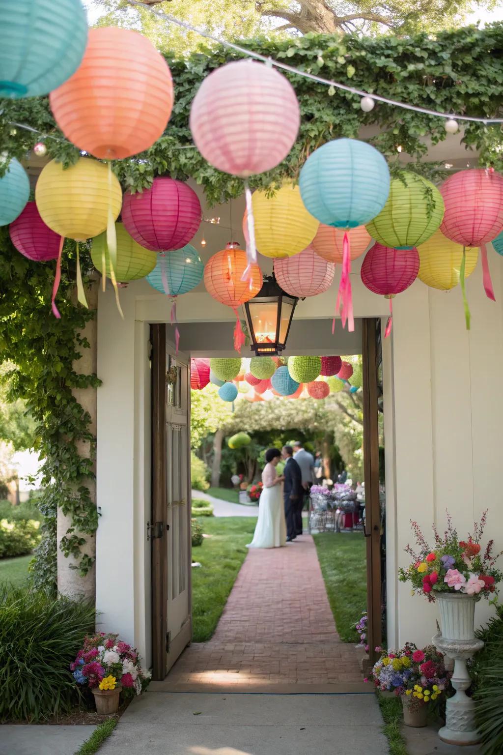 Festive paper lanterns include a sprinkle of color and joy to the bridal shower entrance.