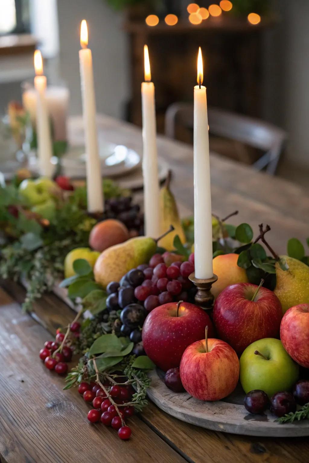 A vibrant centerpiece mixing candles and seasonal fruits.