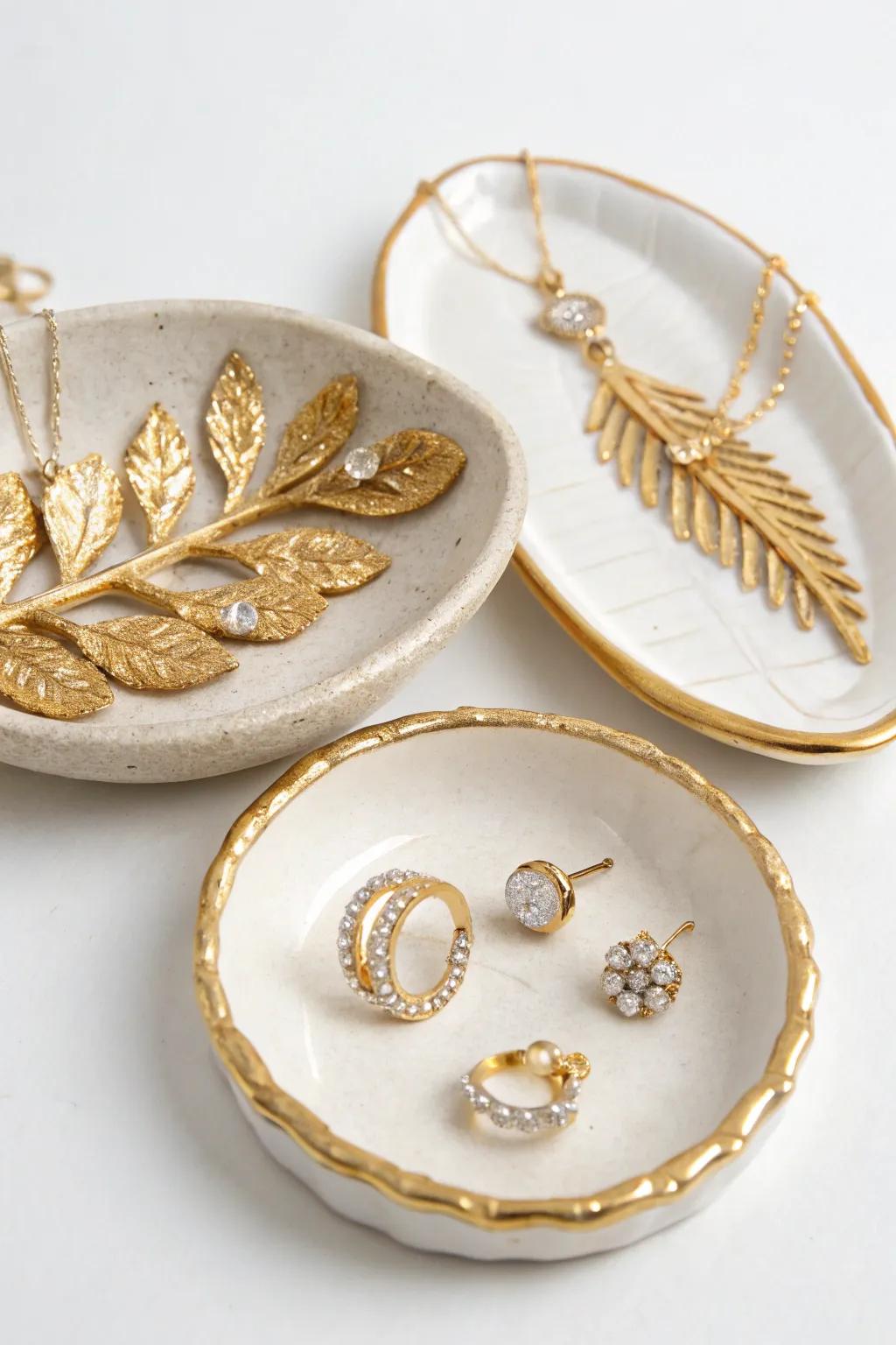 Store your treasures in style with gold leaf dishes.