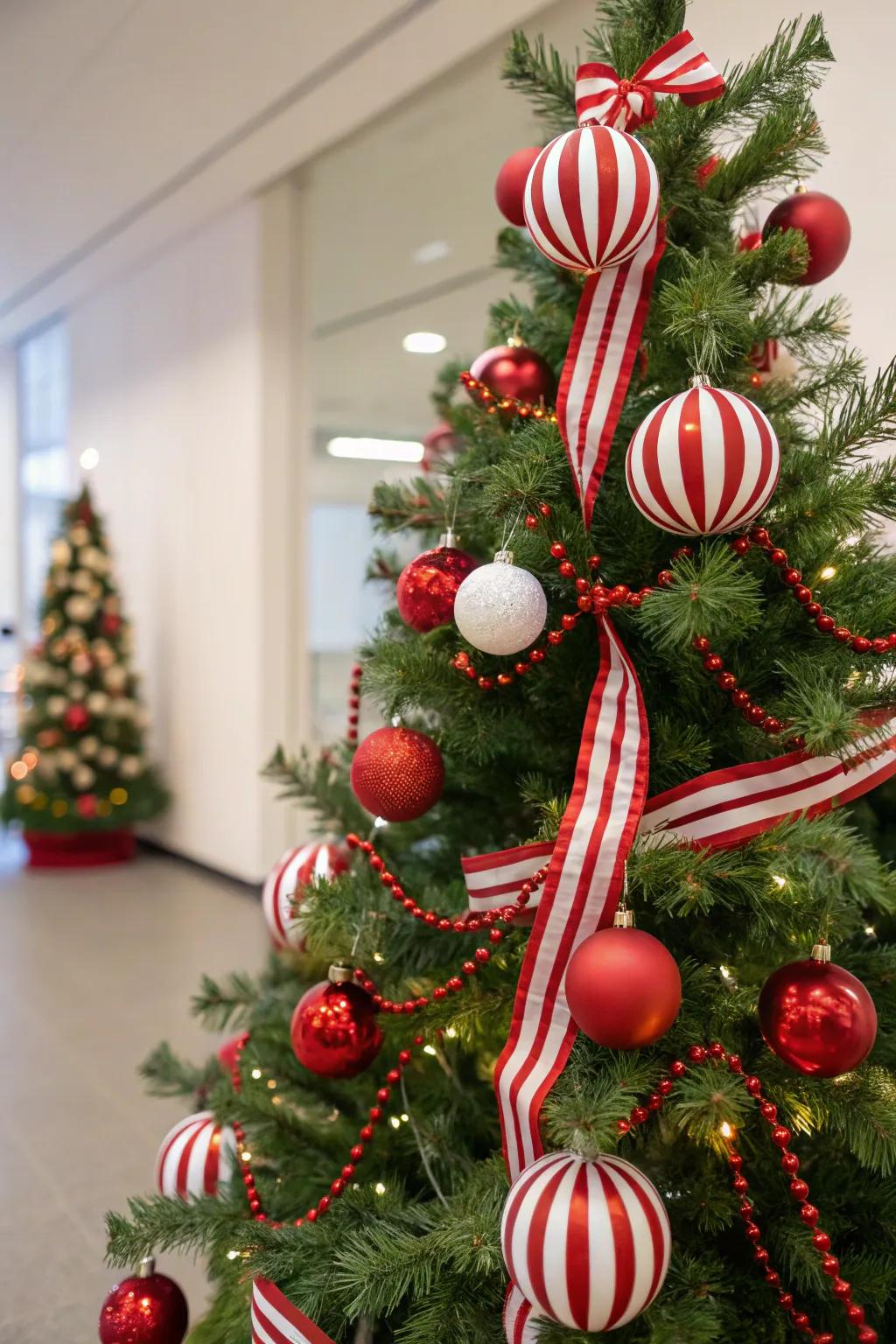 Traditional Christmas tree featuring scarlet and white stripes