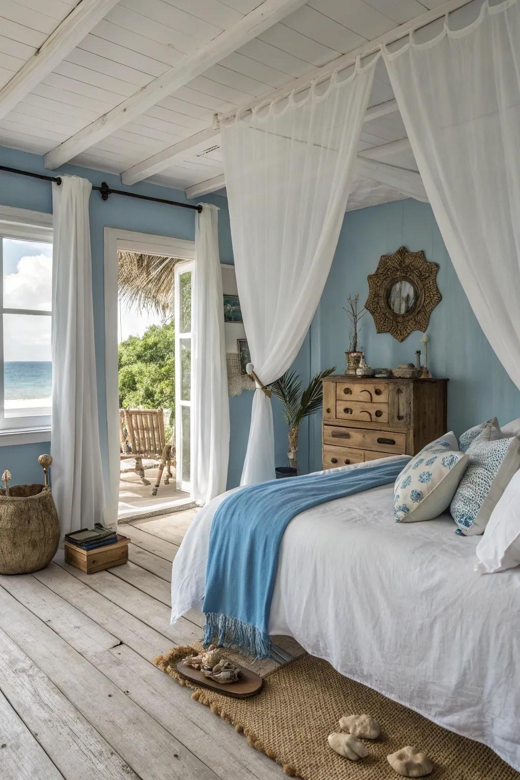 White curtains enhance the coastal vibes in this serene bedroom.