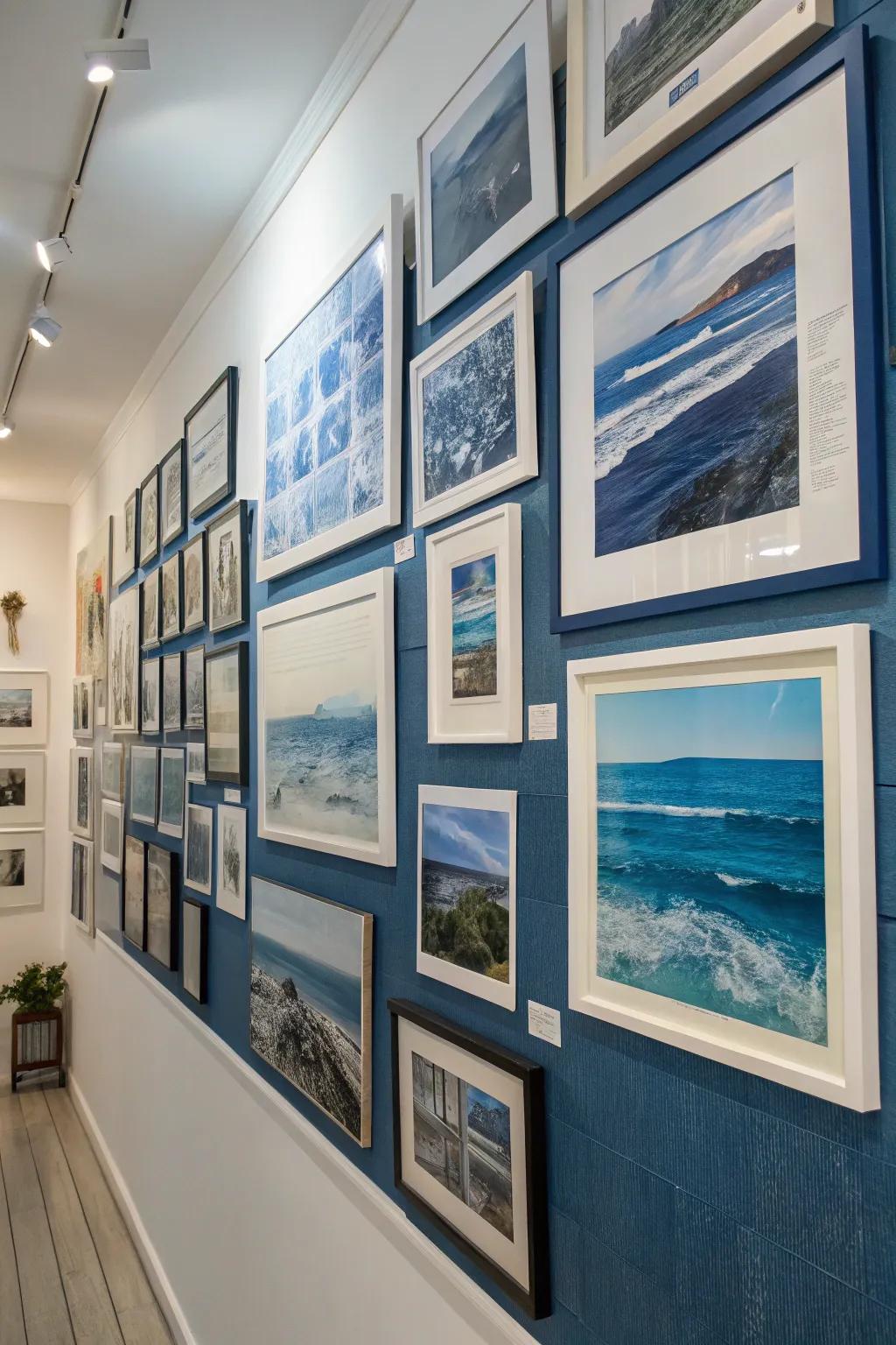 A display wall featuring azure-toned art incorporates a curated and personal touch.
