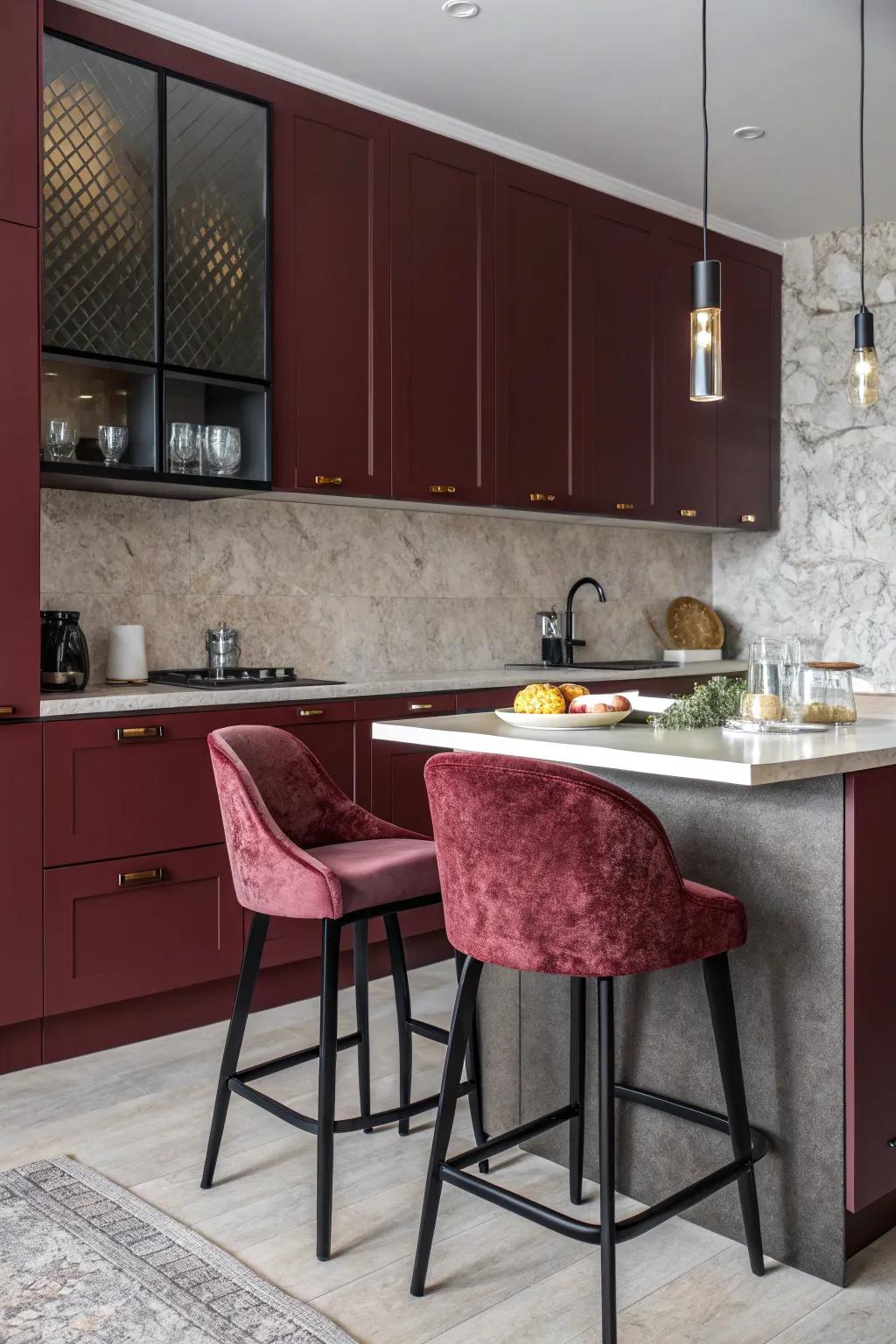 Elegant kitchen with dark red cabinets and velvet textures.