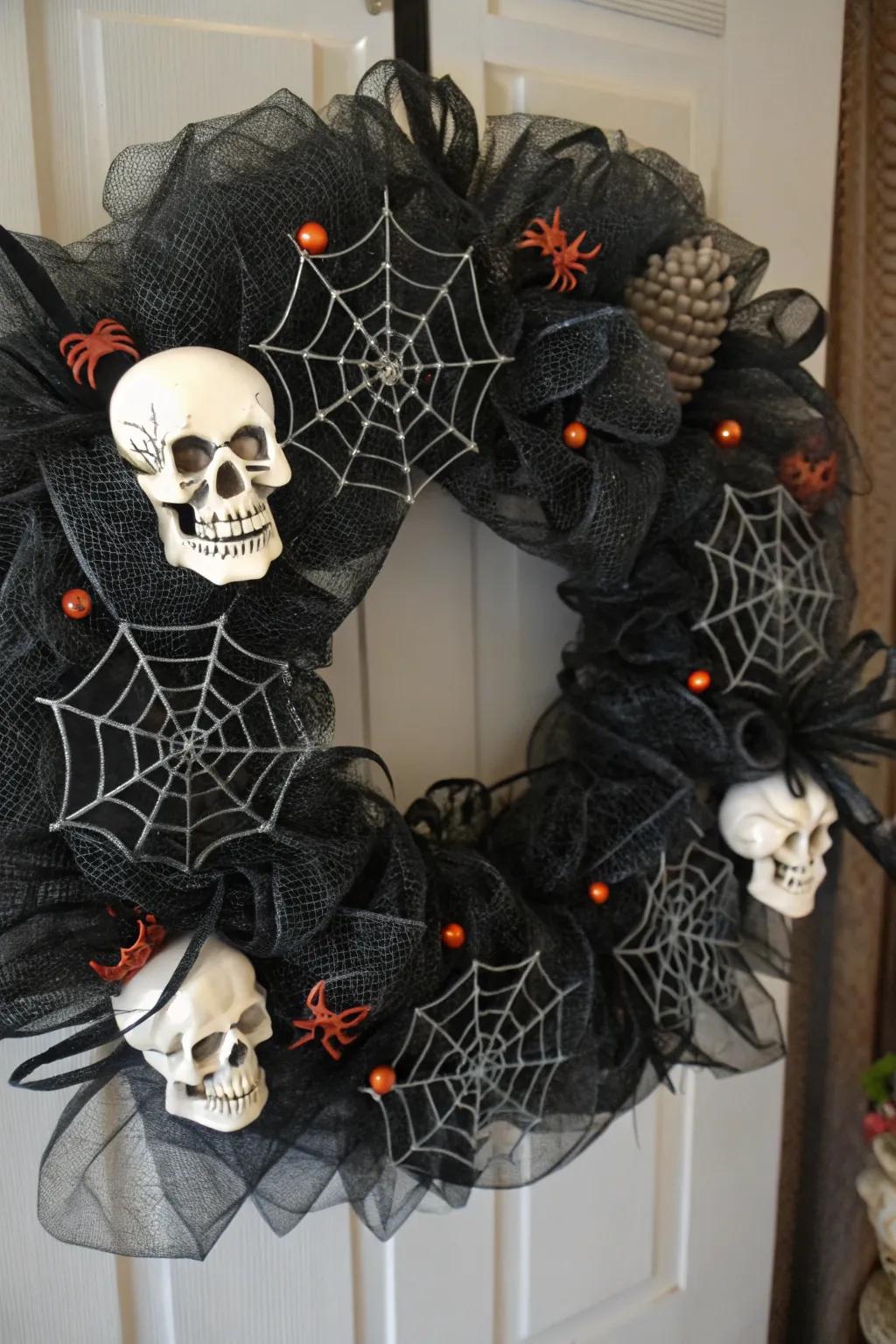 Spooky elements add an eerie elegance to this Halloween wreath.