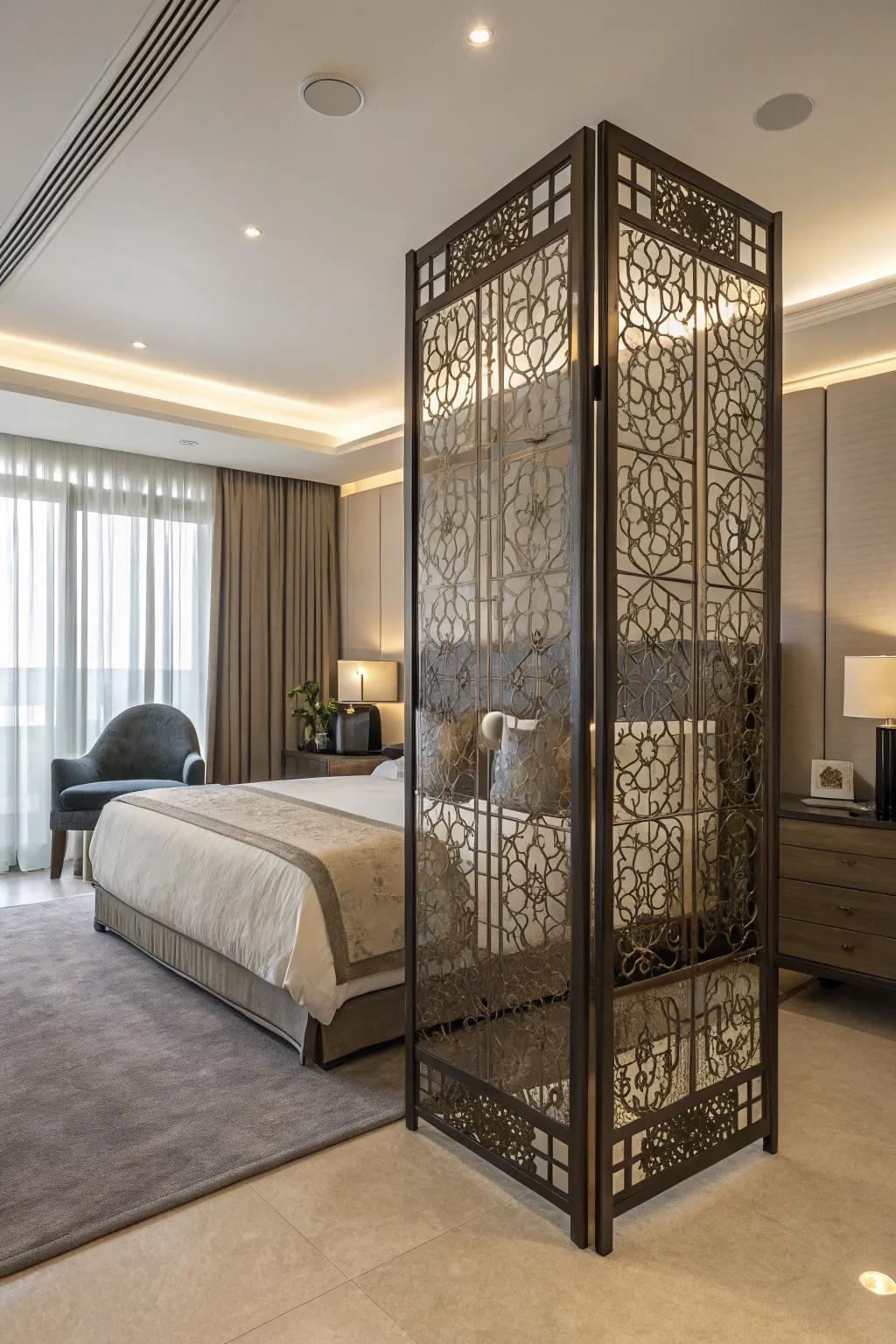 A modern bedroom featuring an artful decorative partition screen.