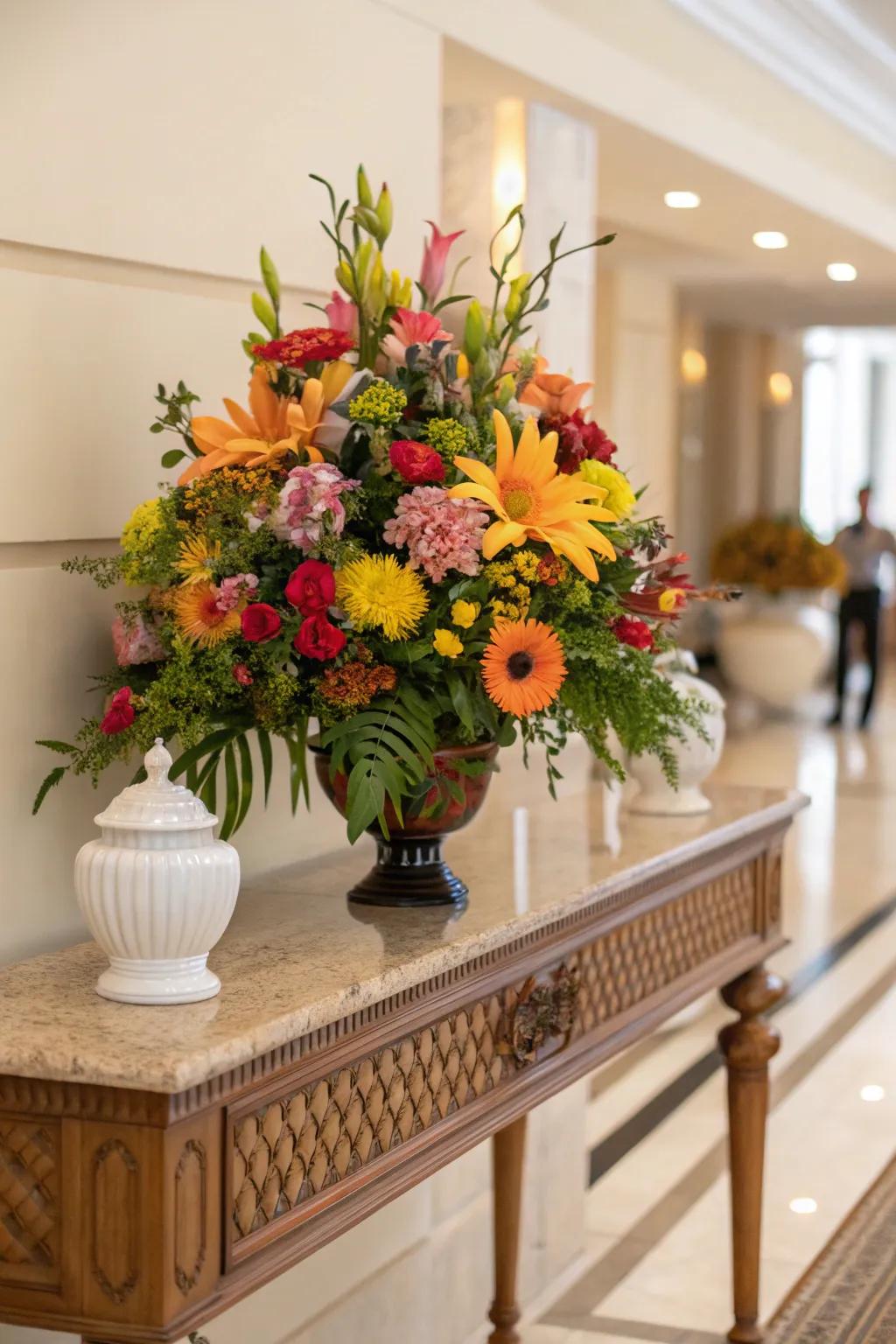 Vibrant floral arrangements revitalize console tables.