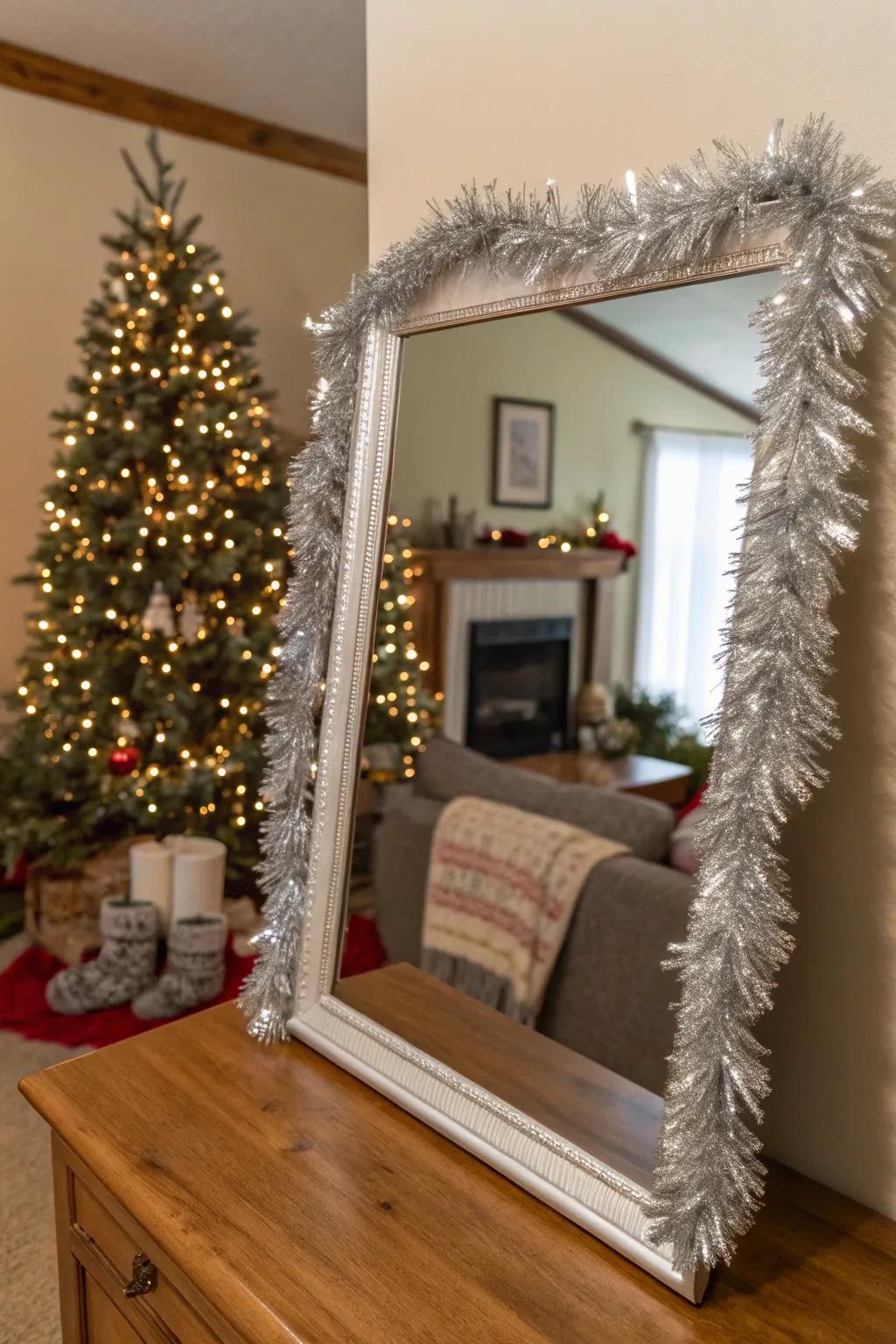 A mirror beautifully framed with tinsel garland.