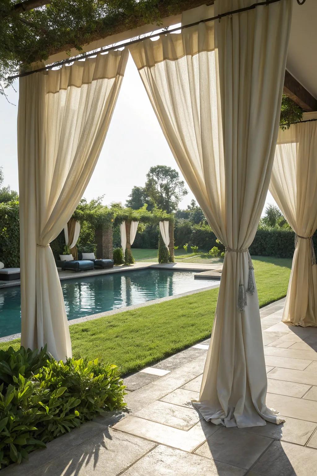 Outdoor curtains add elegance and privacy.