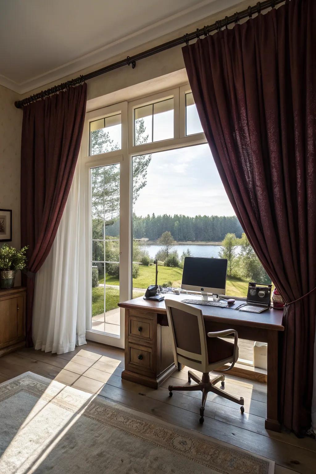 Stylish drapes adding a soft touch to a home office with a big window.
