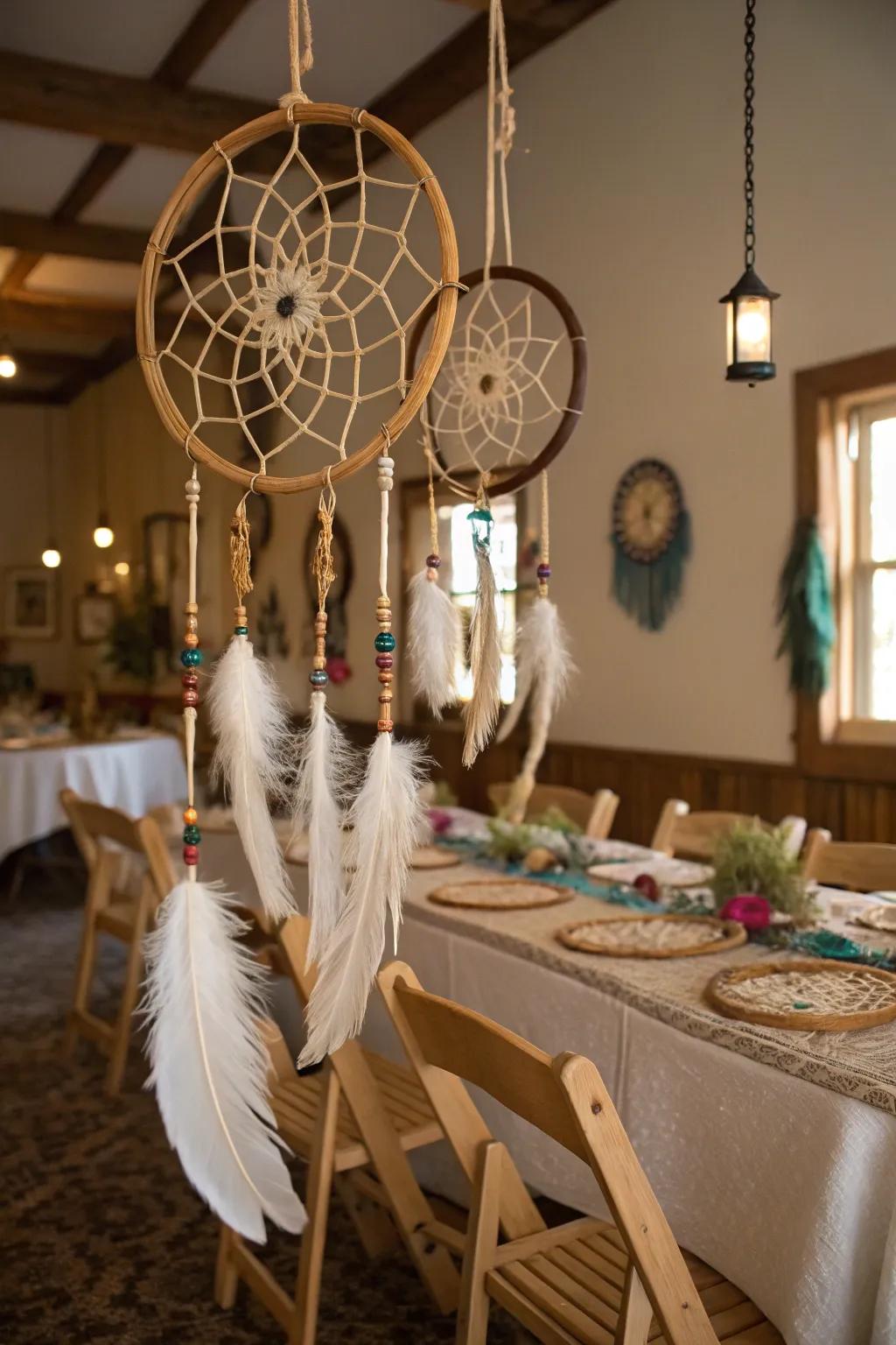 Dreamcatchers contributing a bohemian touch to the countryside wedding setting.