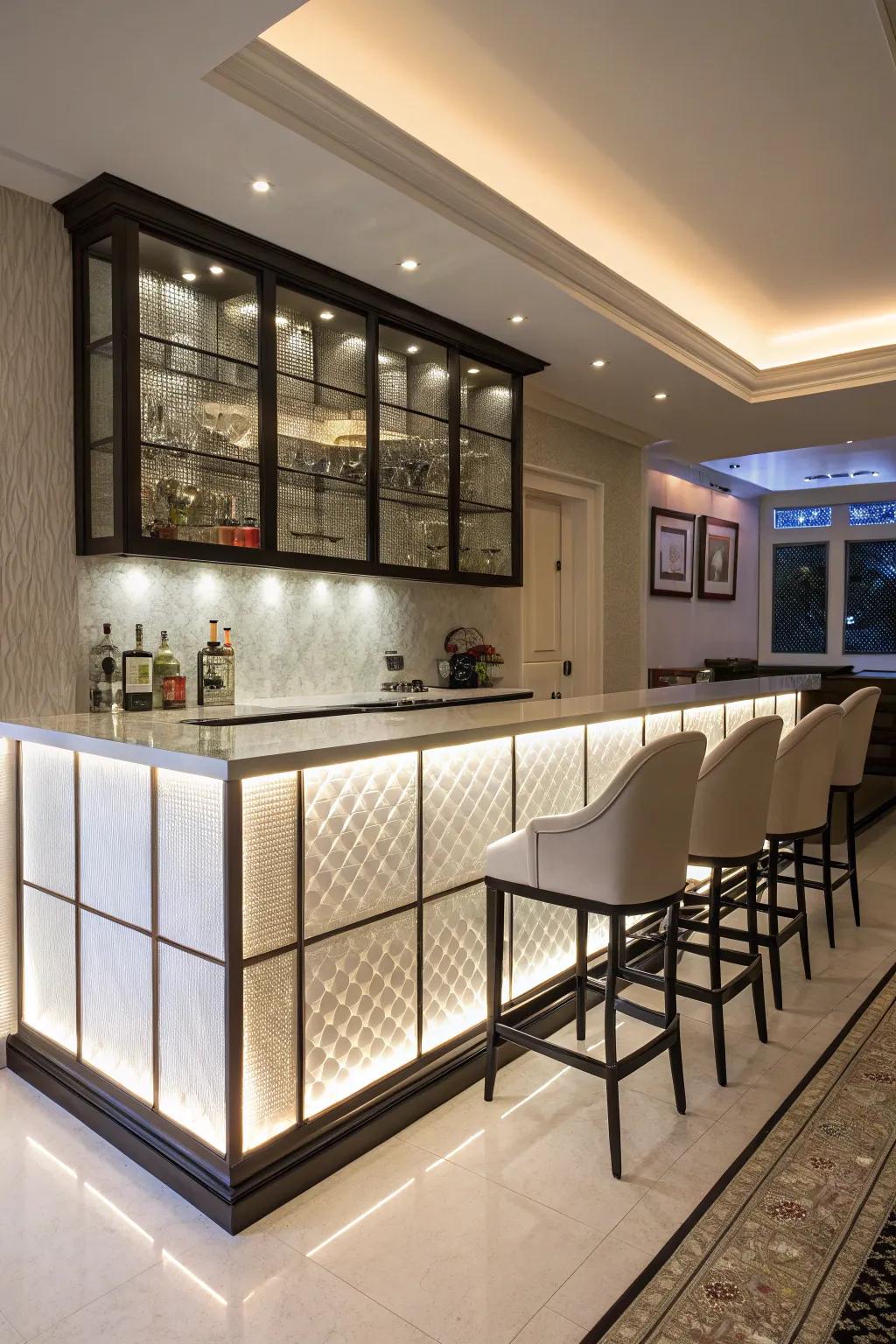 A home bar with a rear-lit sheet backsplash in a modern setting.