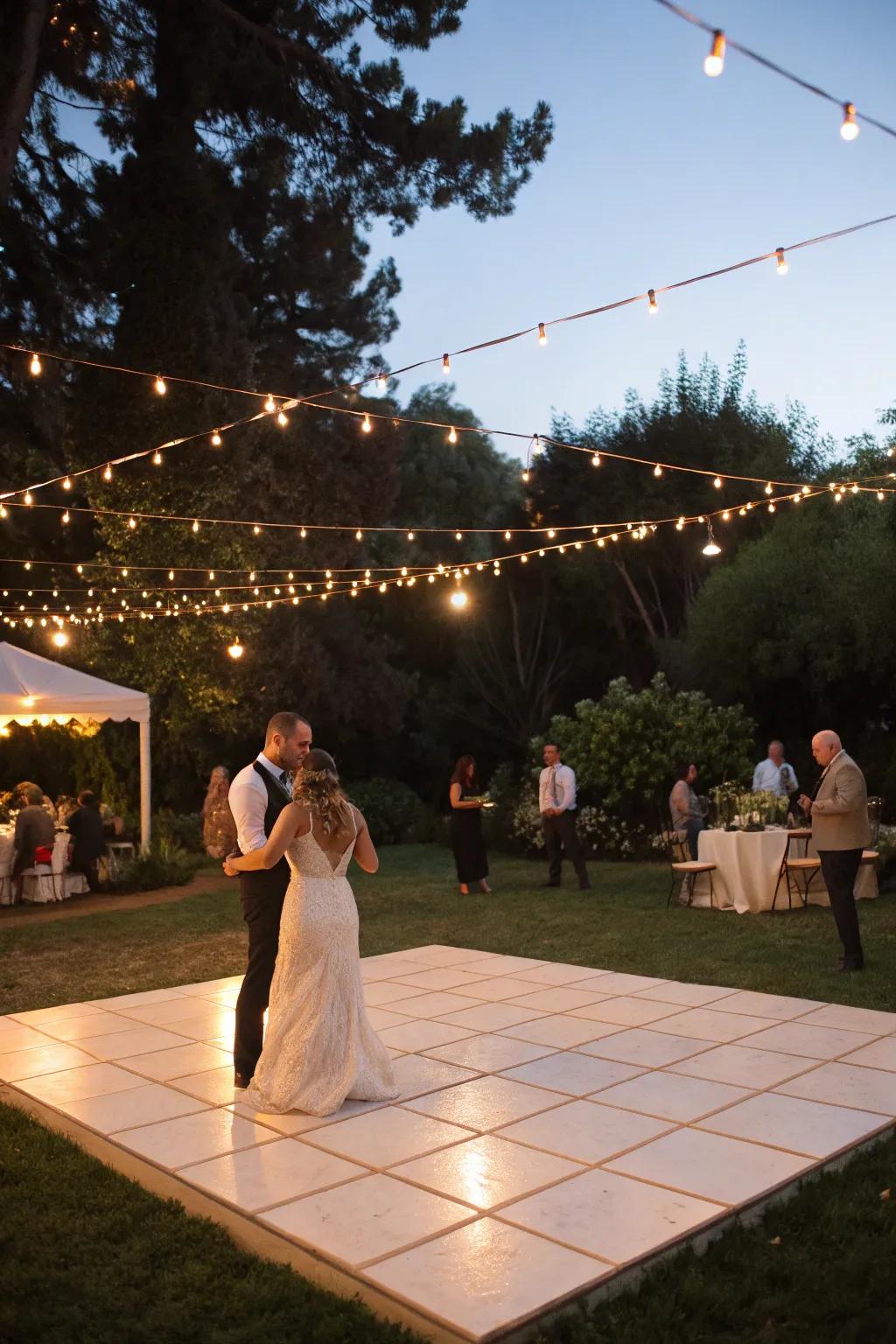 An patio dance flooring encourages attendees to celebrate beneath these heavenly bodies.