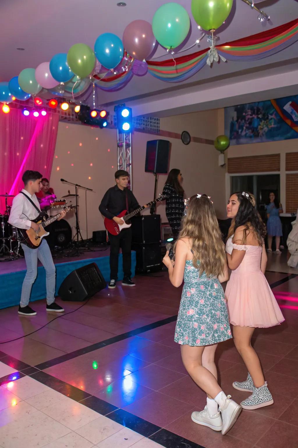 Live music at a vibrant sweet sixteen party.