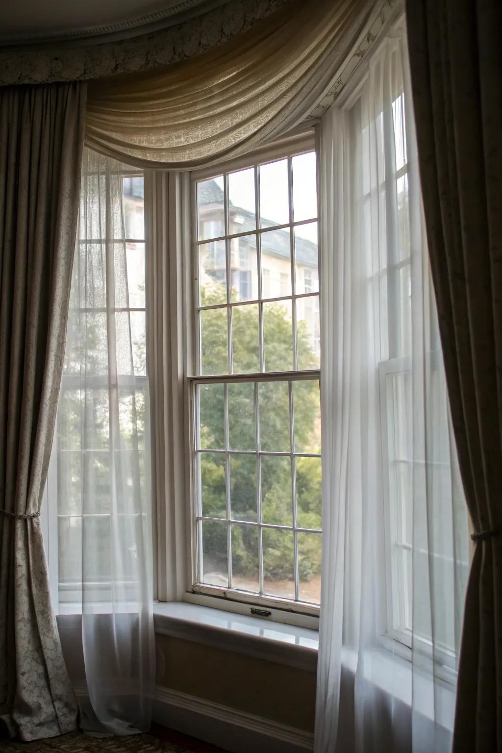 Layered curtains providing both depth and versatility for bay windows.