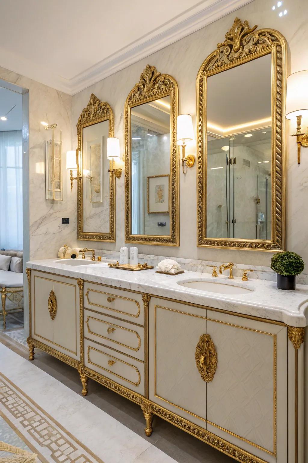 Mirrors accentuated with gold detailing enhance any bathroom with charm and elegance.