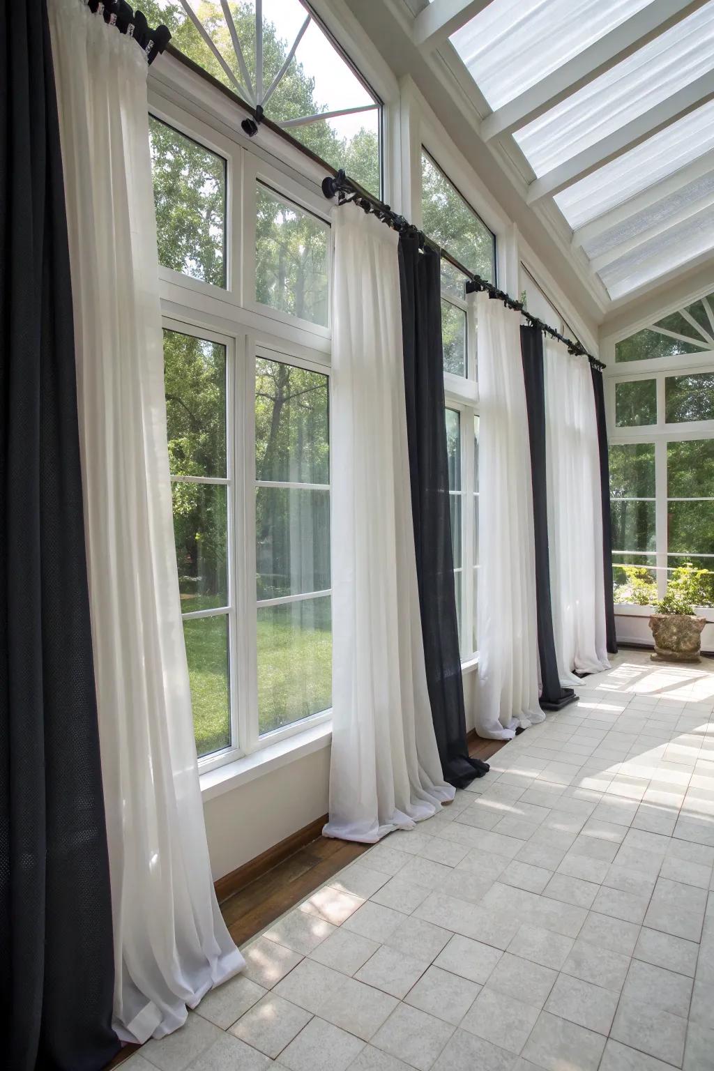 Layered window coverings allow for customizable lighting and privacy in your sunroom.