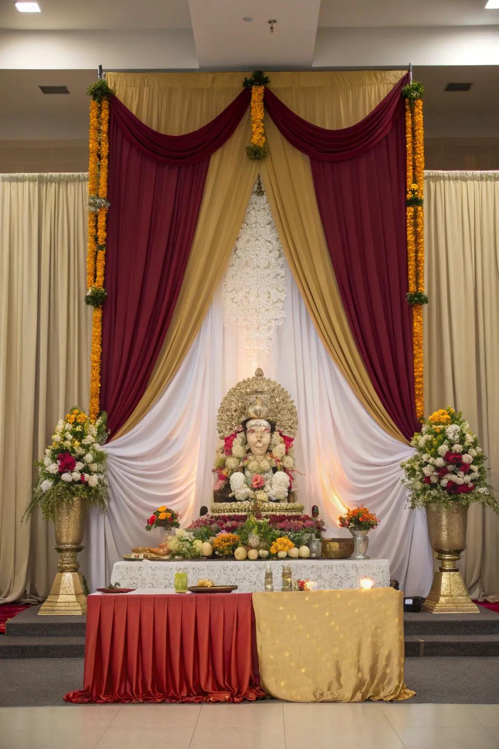 Drapes bringing a majestic feel to the Ganpati arrangement.