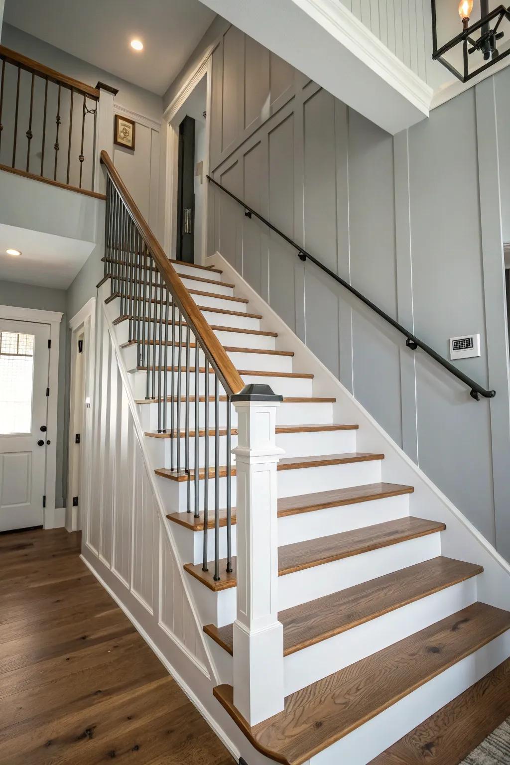 A staircase with a soothing white and gray color scheme, offering a fresh and calming appearance.