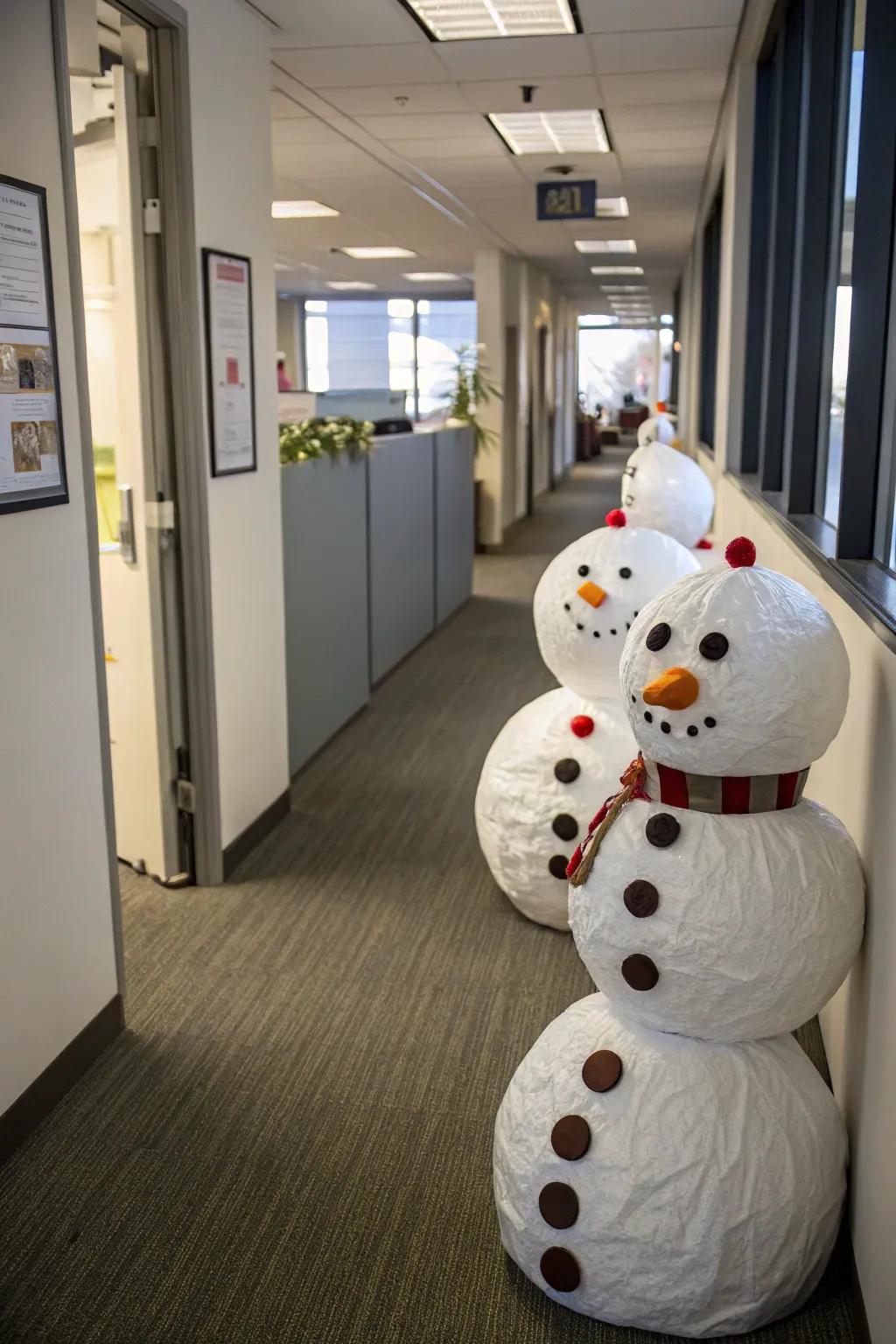 Snowman figures contribute a chilly allure to the office corridors.