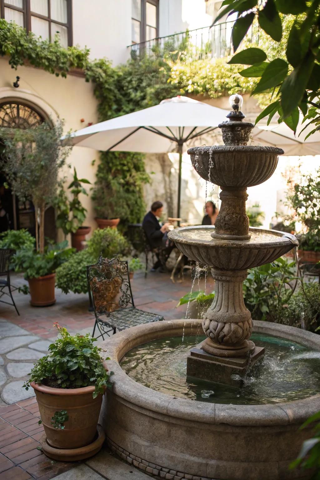 A small-scale fountain introducing charm to a snug patio area.