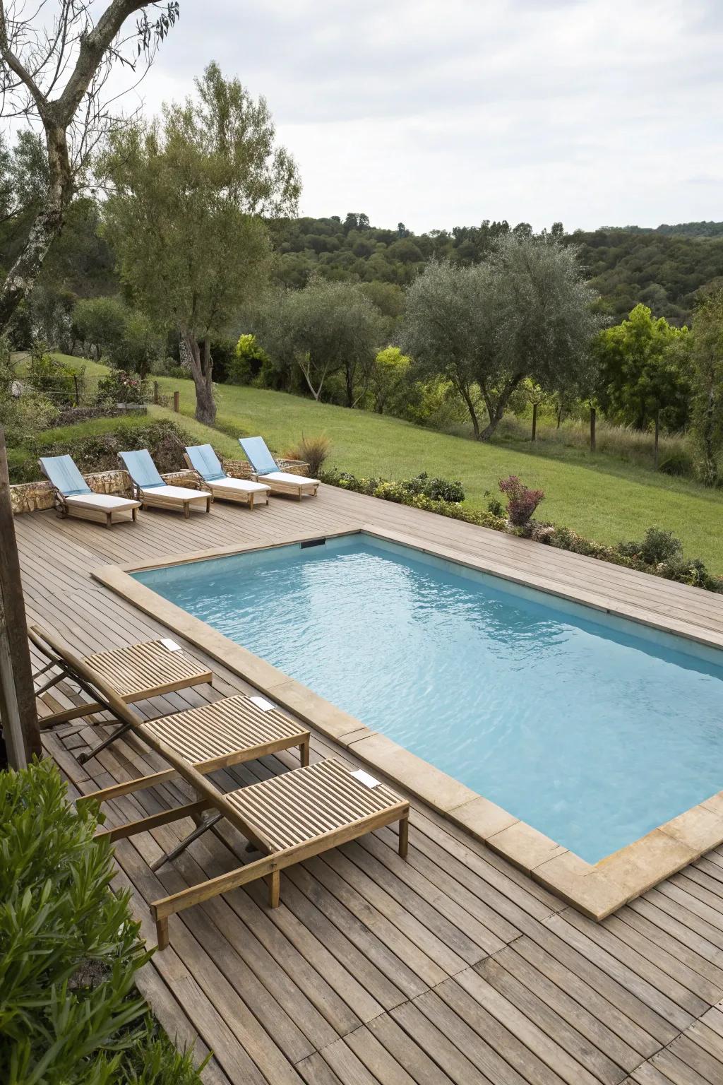 Timber decking imparts a warm and natural ambiance to the poolside.