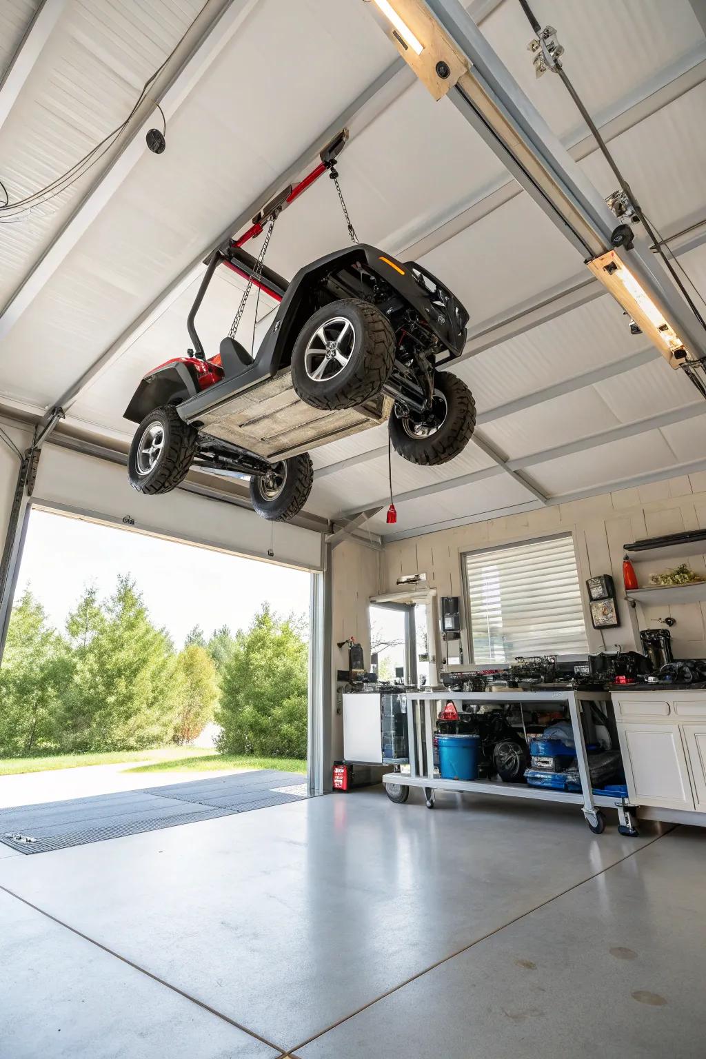 Overhead elevator system raising an electric ride-on car to create additional room.