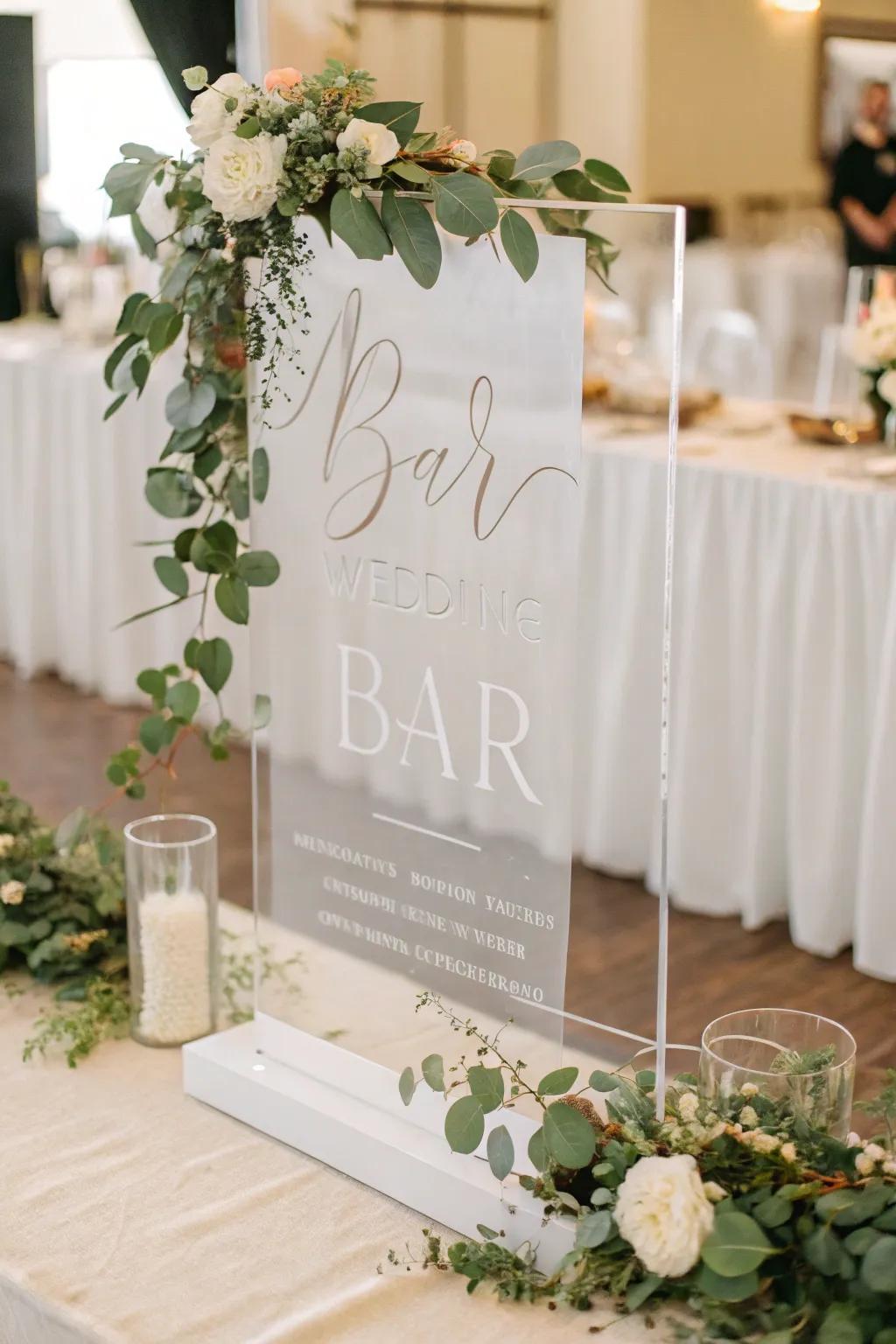 A sophisticated crystal bar sign displaying modern typography and verdant accents.