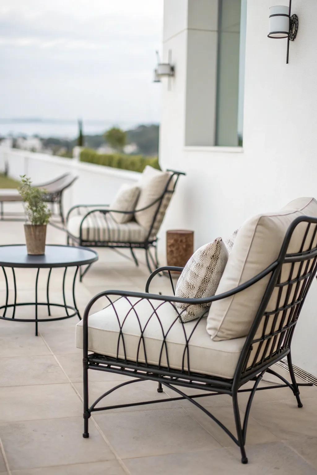 Refined and simple wrought iron designs harmonize flawlessly within a minimalist patio environment.