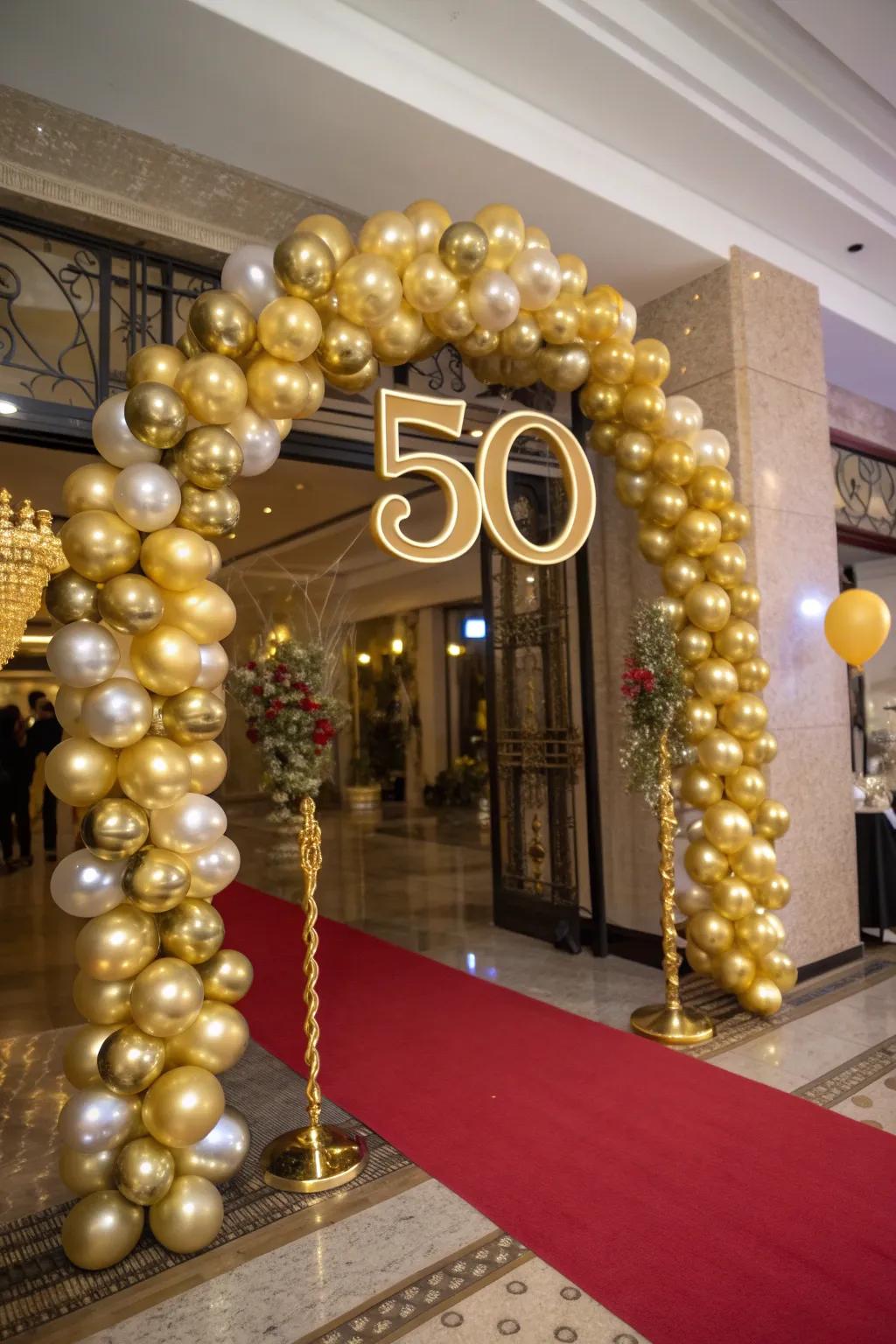 An eye-catching archway of golden balloons welcoming guests to the celebration.
