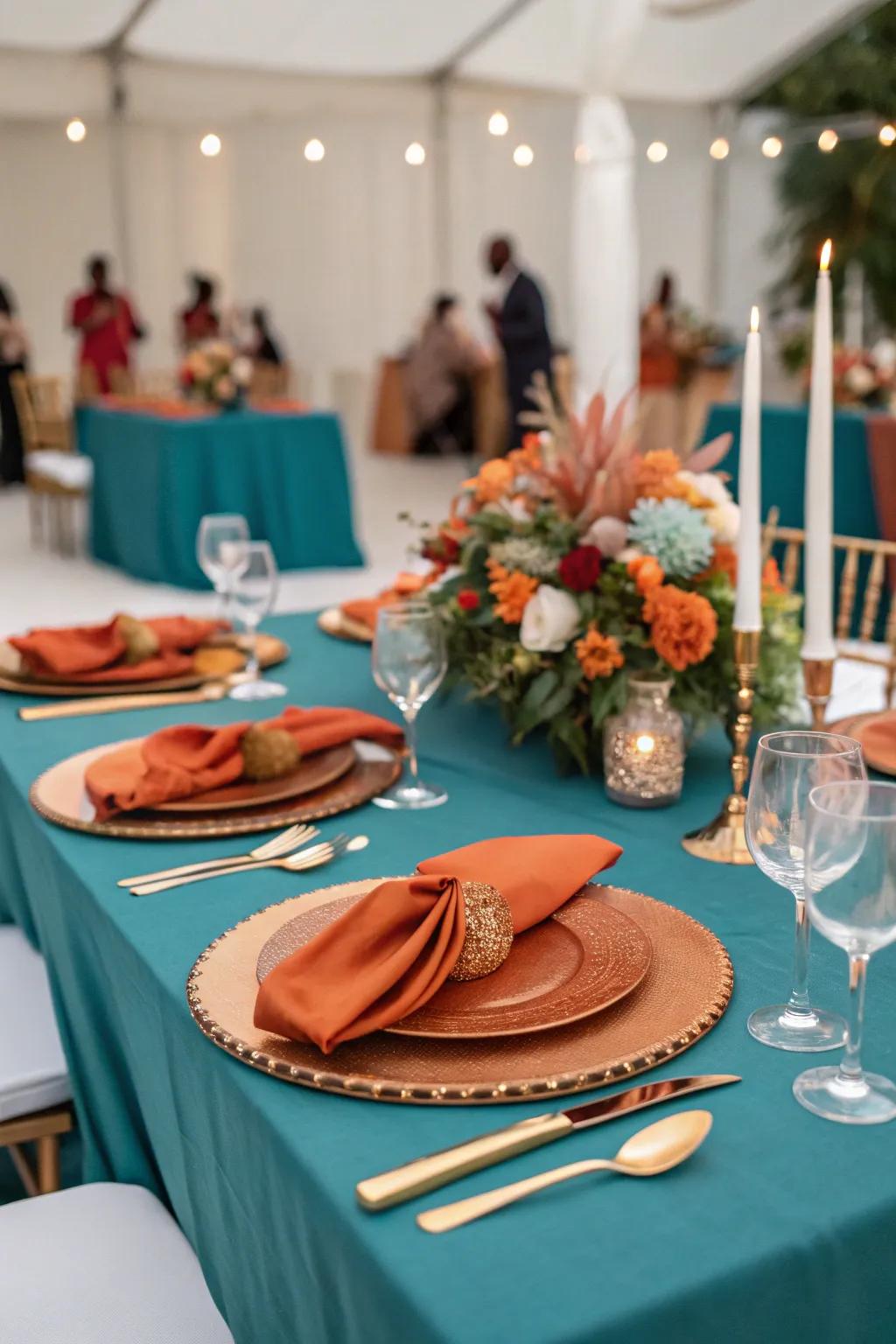 An exquisite tablescape showcasing seafoam green and sunset orange.