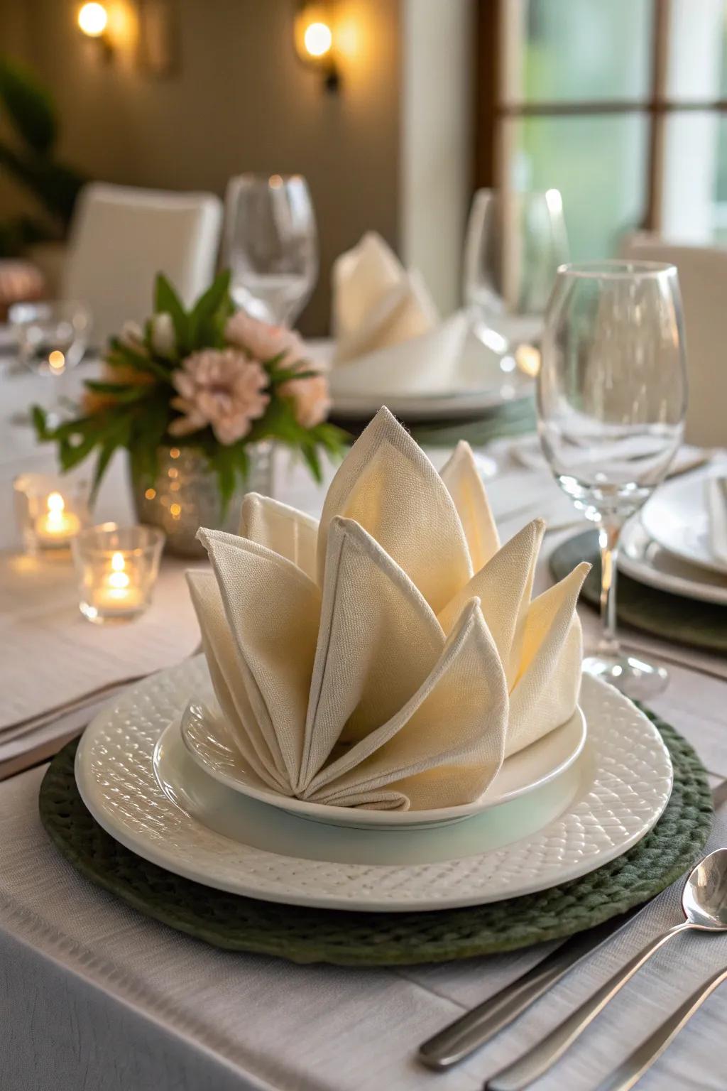 The lotus blossom napkin fold brings an exotic flair to your decor.