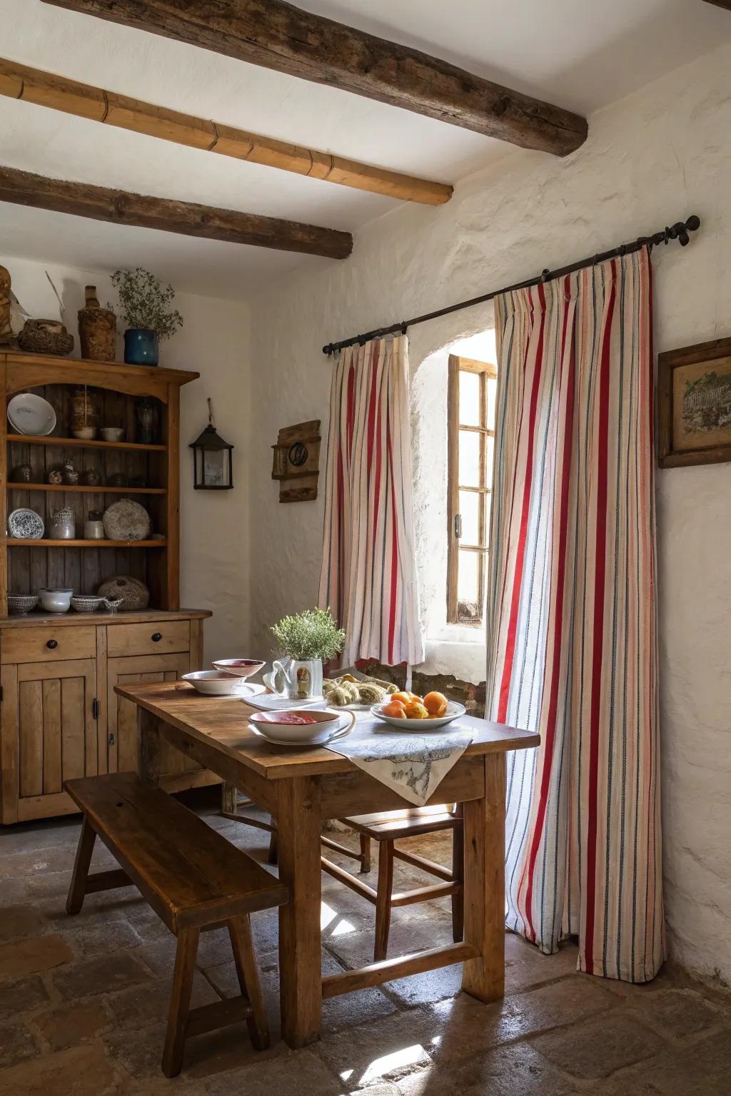 Striped curtains enhancing the allure of a rustic farmhouse dining space.