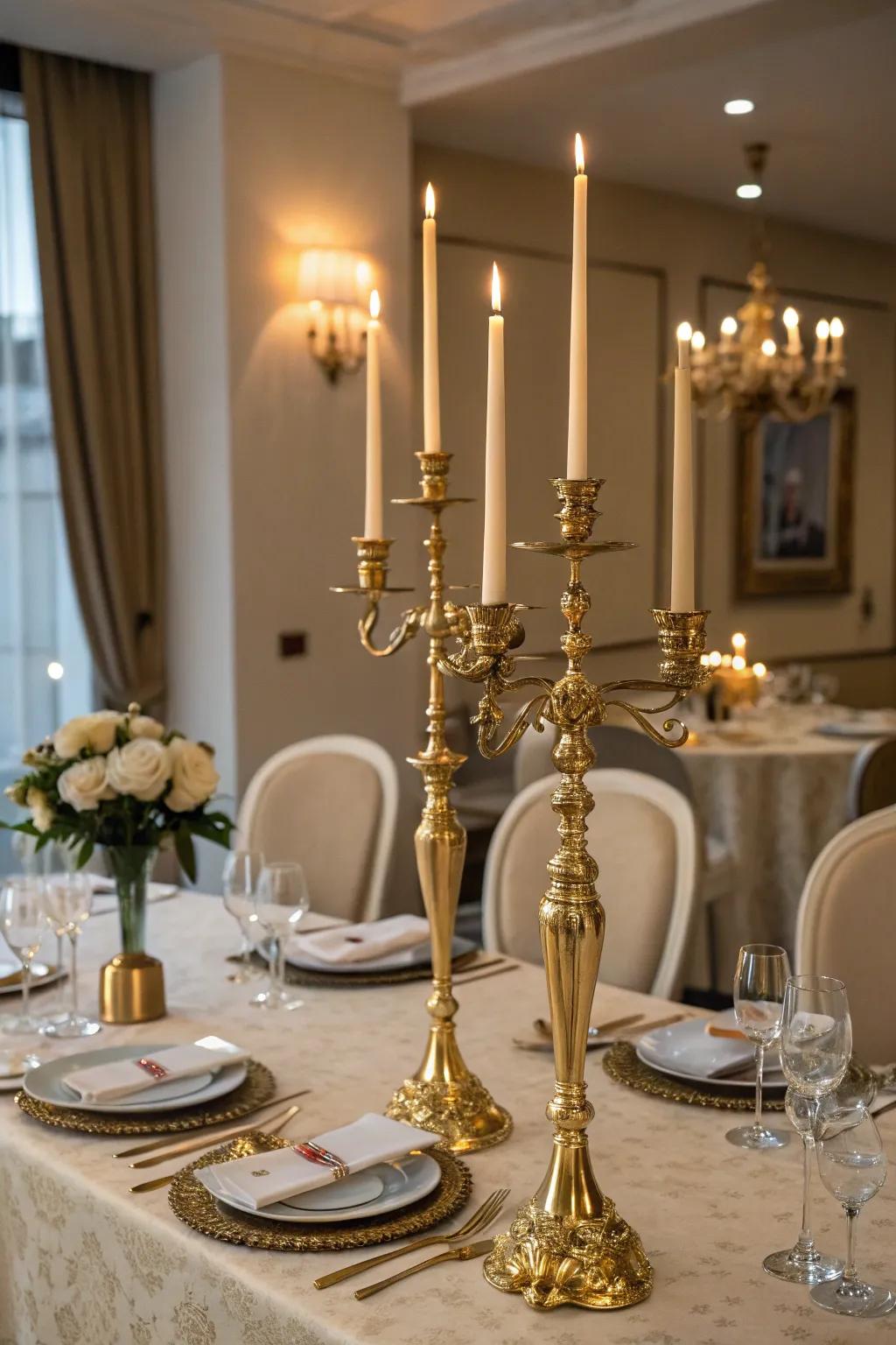 Glamorous gold candelabras creating a romantic ambiance.