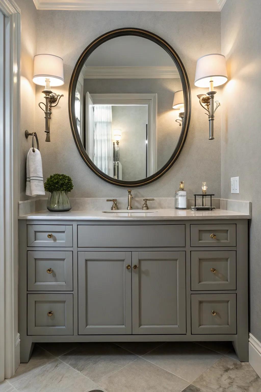Sophisticated lighting and a round mirror improve the overall appearance of the grey vanity.