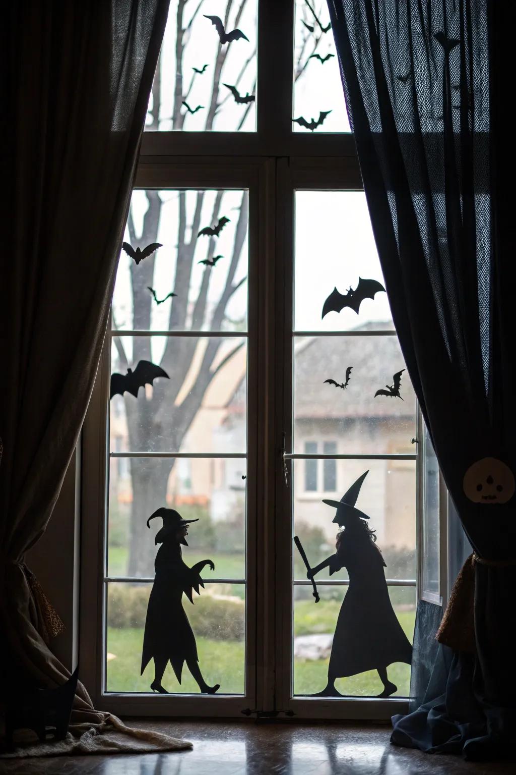 Placing shapes in your windows is an easy way to add a spooky look to your home.