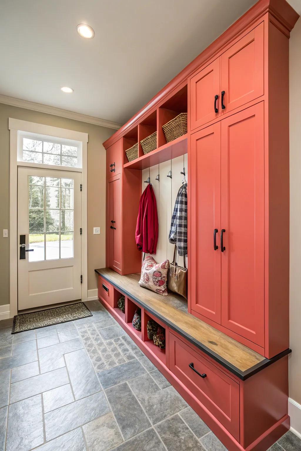 Brightly colored cabinetry enlivens the mudroom with character and warmth.