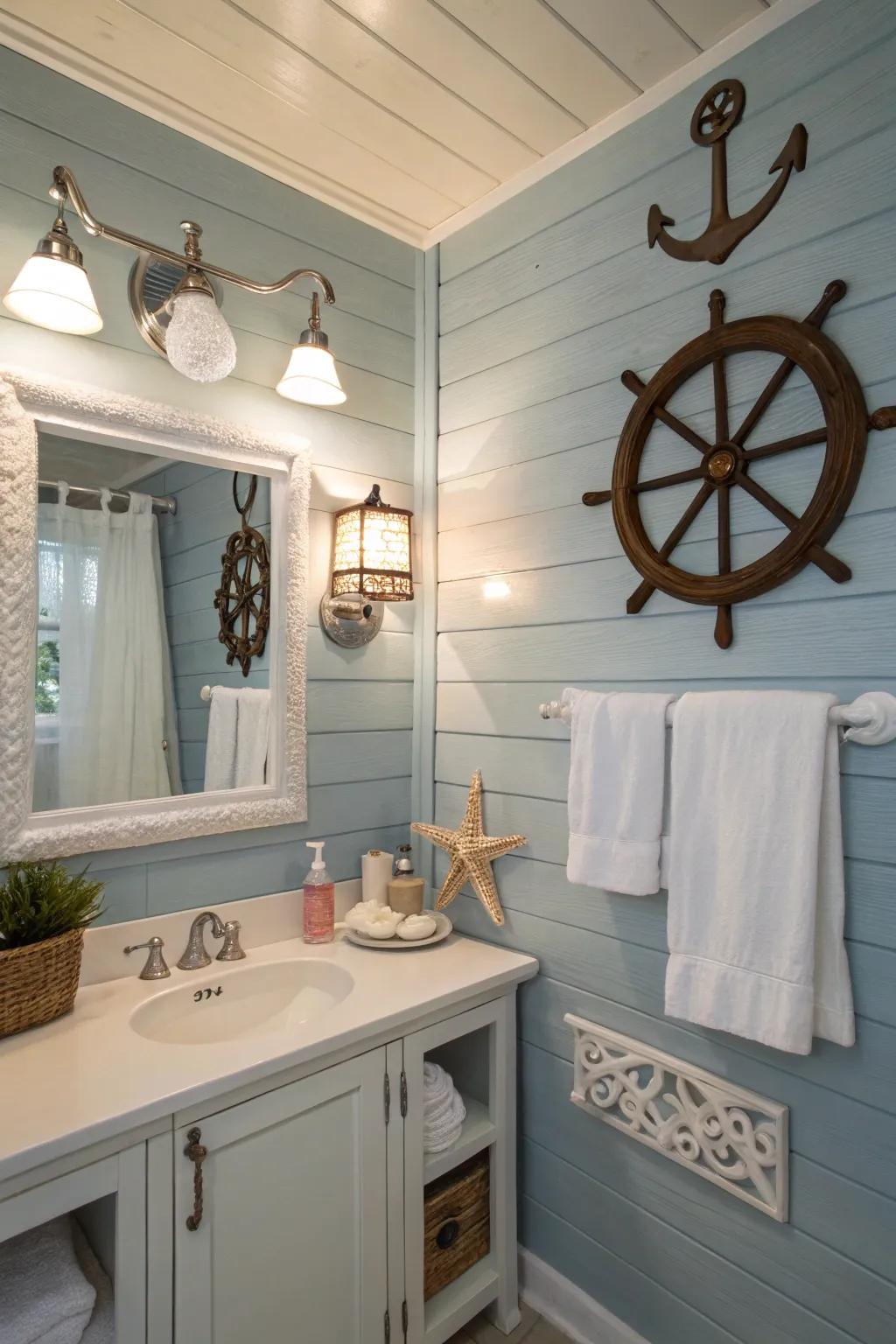 A bathroom with soft blue panel plank walls and nautical-themed ornamentation.