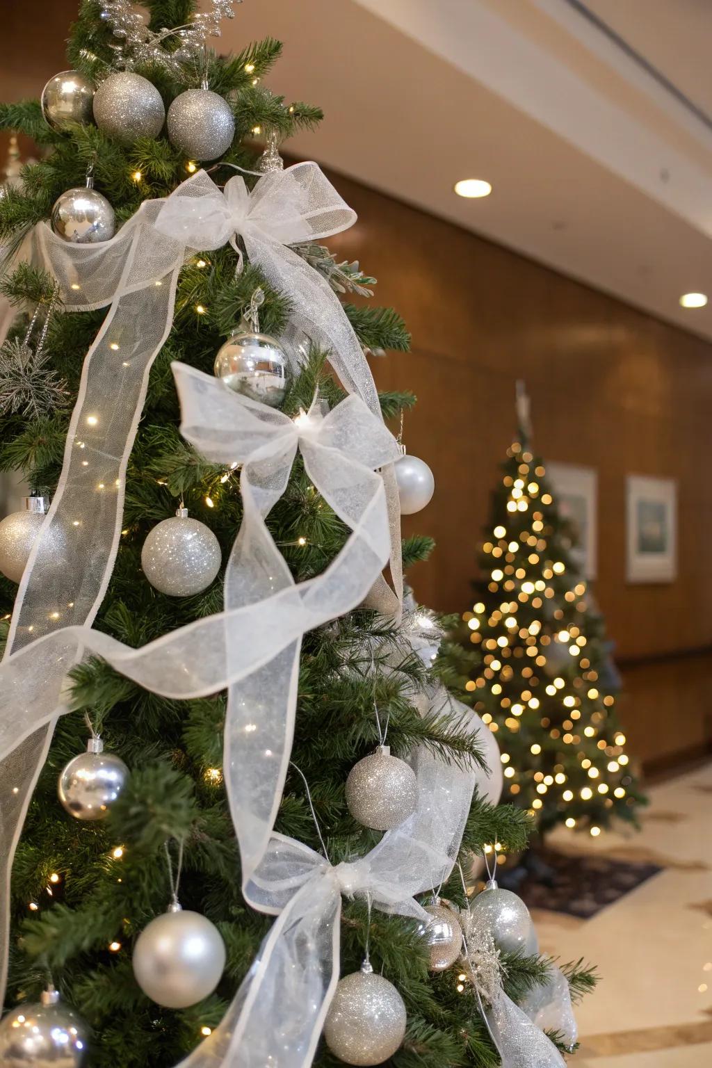 White ribbons lend a gentle, sophisticated touch to the tree.