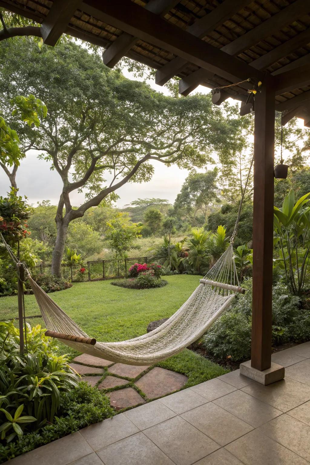 A comfy hammock inviting you to relax in a backyard.
