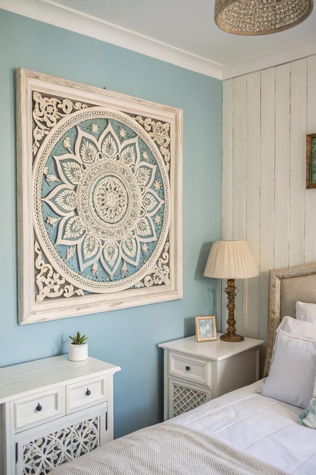 Wall pieces enhance the visual charm of a blue and white themed bedroom.