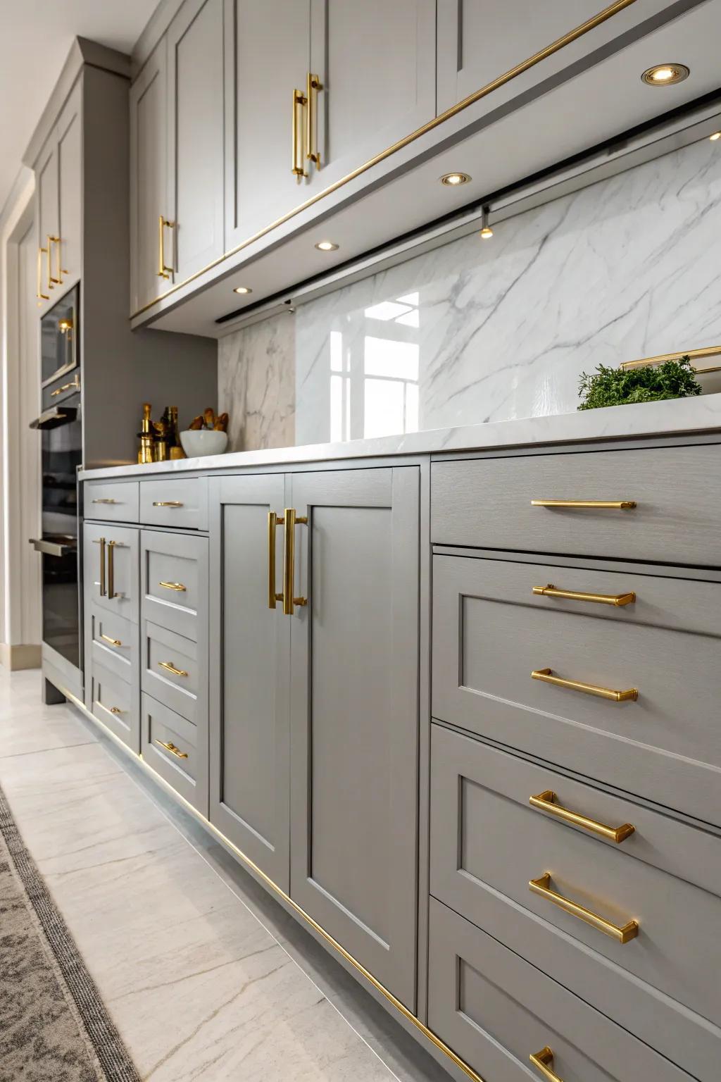 Brass hardware introducing an elegant sparkle to gray cabinets.