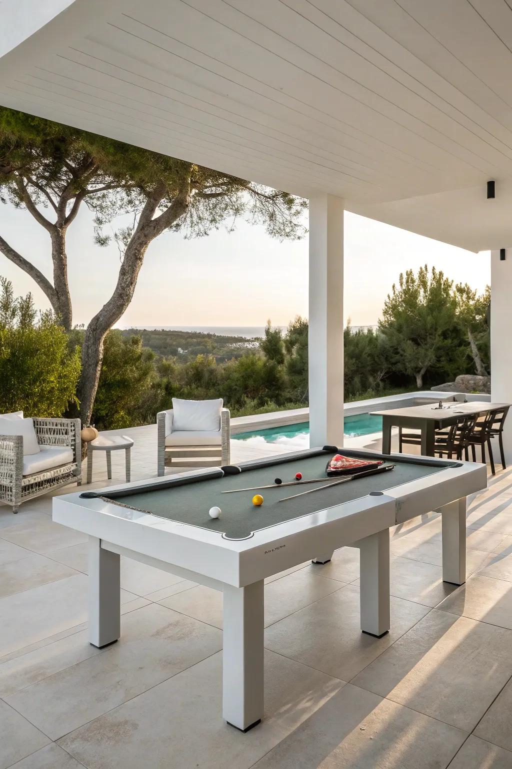 A sleek, modern outdoor pool table area with simple furniture.