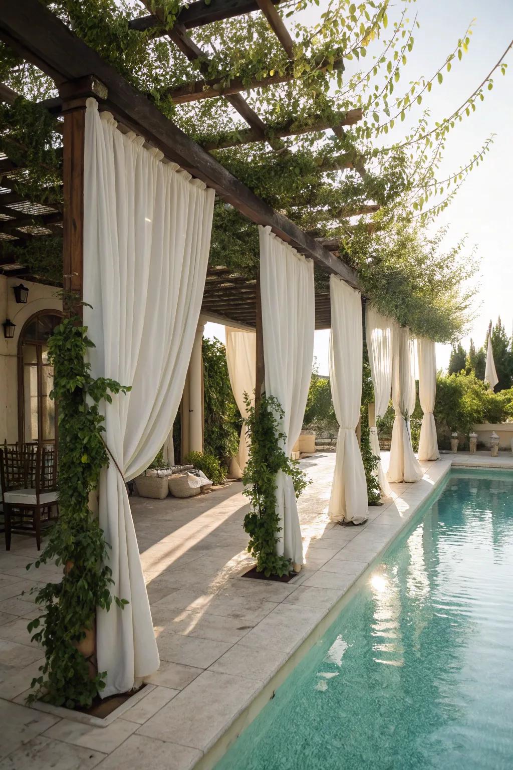 A pergola with drapes offers privacy and elegance.