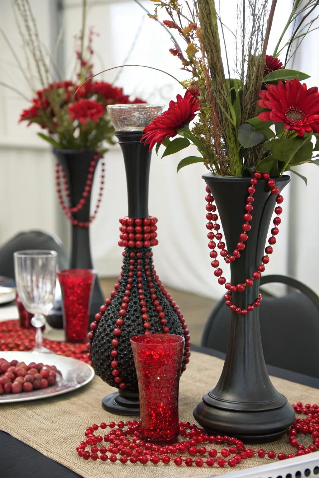 Blended elements featuring charcoal ceramics joined by scarlet beads adding feel in the arrangement.