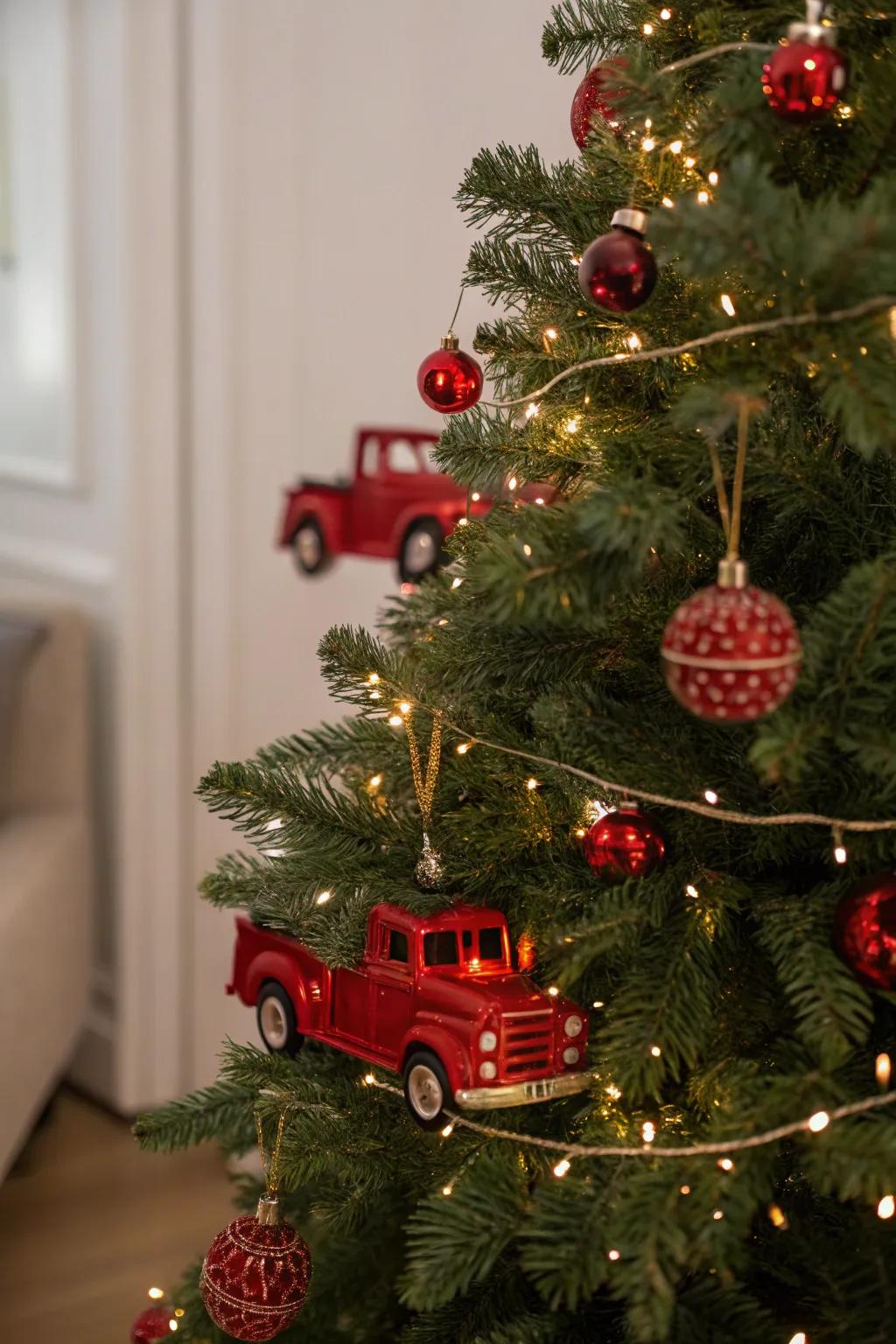 Whimsical red truck ornaments adding charm to the Christmas tree.