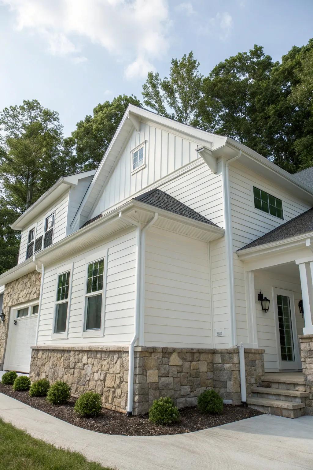 A rustic-modern house blending white panelling with natural stone features.